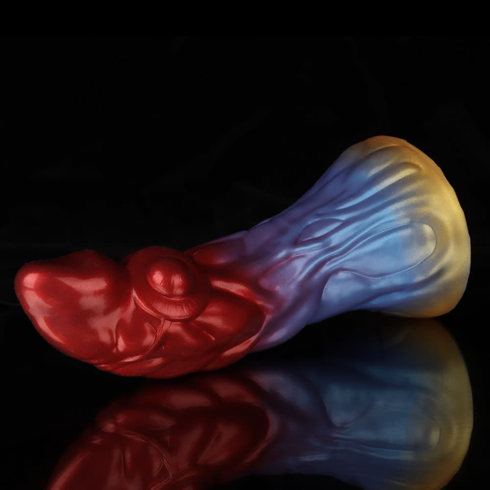 Dildo mit Farbverlauf in Rot, Lila und Gold des Schützen